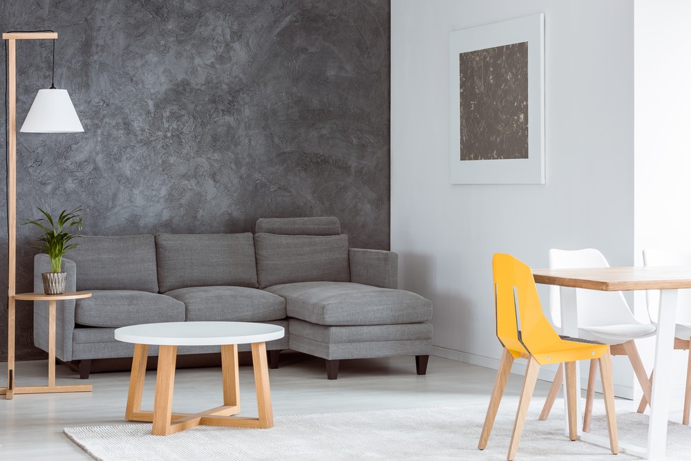 One mustard chair is all that’s needed in this Mid Century Modern room