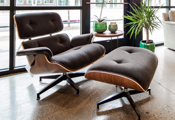 The Eames Lounge chair with its display of leather and wood grain remains an office and home favorite today. 
